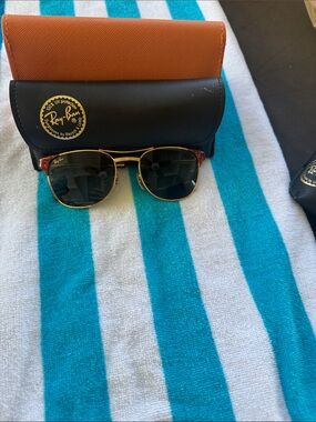 Authentic, women’s Ray-Ban Gold Frame Sunglasses with Dark Green Lenses